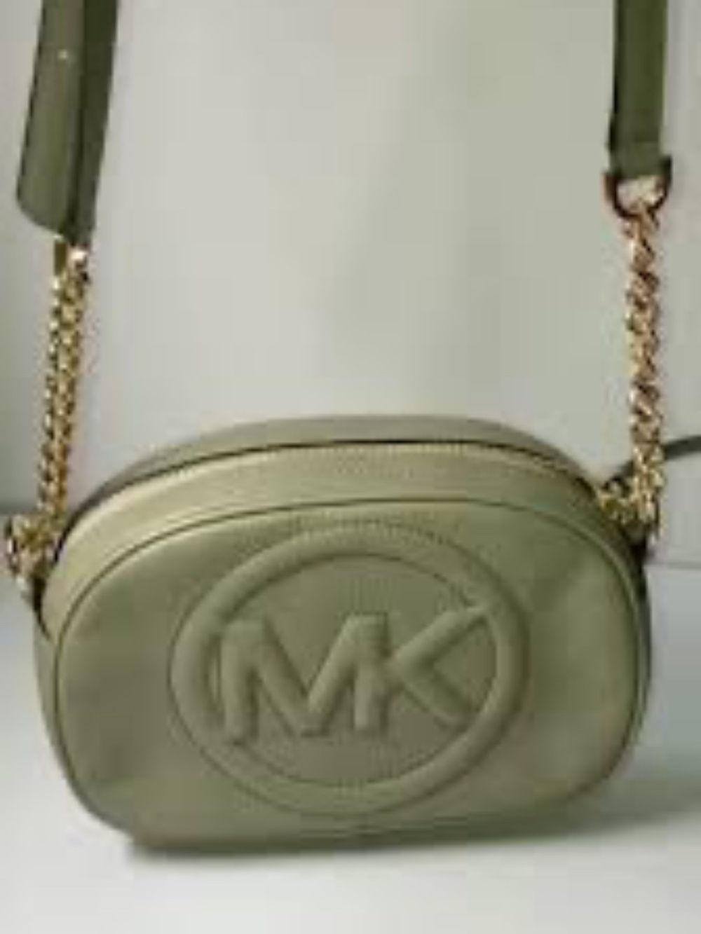 Michael Kors Brynn Small Oval Pebbled Leather Crossbody Camera Bag in a sage